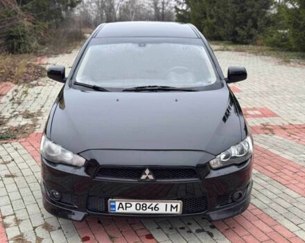 Черный Мицубиси Лансер, объемом двигателя 2 л и пробегом 217 тыс. км за 5500 $, фото 1 на Automoto.ua