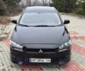 Черный Мицубиси Лансер, объемом двигателя 2 л и пробегом 217 тыс. км за 5500 $, фото 1 на Automoto.ua