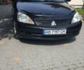 Чорний Міцубісі Lancer, об'ємом двигуна 1.58 л та пробігом 220 тис. км за 4200 $, фото 1 на Automoto.ua