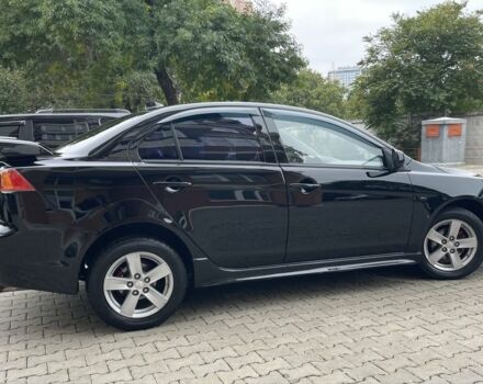 Чорний Міцубісі Lancer, об'ємом двигуна 2 л та пробігом 200 тис. км за 6800 $, фото 4 на Automoto.ua