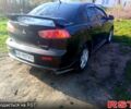Чорний Міцубісі Lancer, об'ємом двигуна 2 л та пробігом 180 тис. км за 7300 $, фото 1 на Automoto.ua