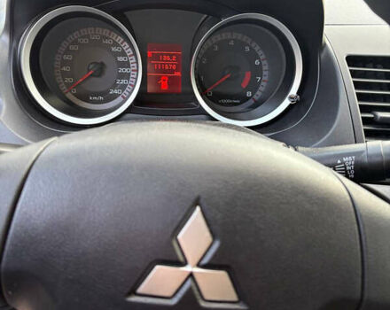 Черный Мицубиси Лансер, объемом двигателя 1.5 л и пробегом 111 тыс. км за 7500 $, фото 16 на Automoto.ua
