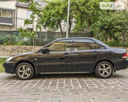 Чорний Міцубісі Lancer, об'ємом двигуна 1.6 л та пробігом 130 тис. км за 5500 $, фото 30 на Automoto.ua