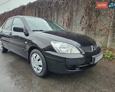 Черный Мицубиси Лансер, объемом двигателя 1.6 л и пробегом 152 тыс. км за 4999 $, фото 3 на Automoto.ua