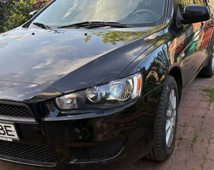 Черный Мицубиси Лансер, объемом двигателя 1.5 л и пробегом 111 тыс. км за 7500 $, фото 8 на Automoto.ua