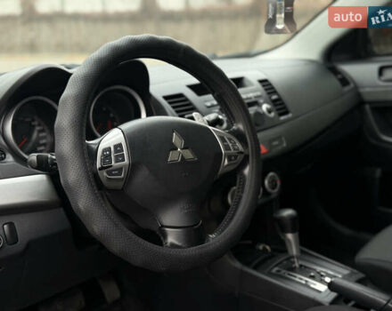 Чорний Міцубісі Lancer, об'ємом двигуна 2 л та пробігом 224 тис. км за 6500 $, фото 9 на Automoto.ua