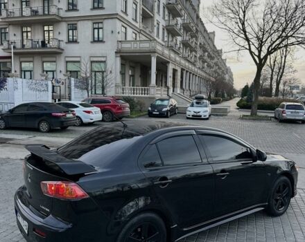 Черный Мицубиси Лансер, объемом двигателя 2 л и пробегом 242 тыс. км за 6200 $, фото 12 на Automoto.ua