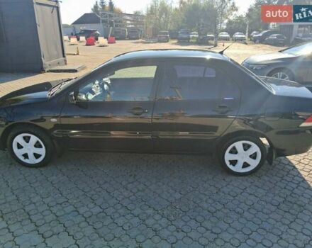 Міцубісі Lancer 2007 у Чернівцях на Automoto.ua Чорний Міцубісі Lancer, об'ємом двигуна 1.58 л та пробігом 247 тис. км за 4300 $, фото 9 на Automoto.ua