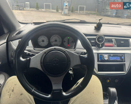 Чорний Міцубісі Lancer, об'ємом двигуна 2 л та пробігом 210 тис. км за 5500 $, фото 52 на Automoto.ua