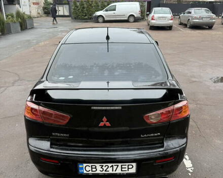 Чорний Міцубісі Lancer, об'ємом двигуна 2 л та пробігом 281 тис. км за 6000 $, фото 10 на Automoto.ua