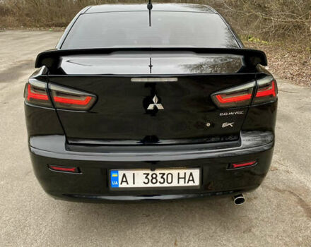 Черный Мицубиси Лансер, объемом двигателя 2 л и пробегом 164 тыс. км за 8300 $, фото 13 на Automoto.ua