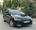 Черный Мицубиси Лансер, объемом двигателя 2 л и пробегом 145 тыс. км за 7300 $, фото 7 на Automoto.ua