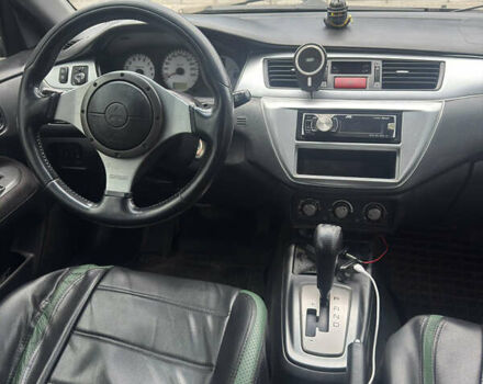 Чорний Міцубісі Lancer, об'ємом двигуна 2 л та пробігом 210 тис. км за 5500 $, фото 41 на Automoto.ua