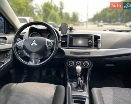 Мицубиси Лансер 2007 в Киеве на Automoto.ua Черный Мицубиси Лансер, объемом двигателя 2 л и пробегом 206 тыс. км за 6900 $, фото 12 на Automoto.ua