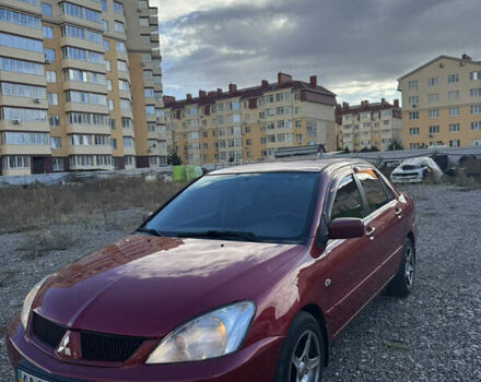 Чорний Міцубісі Lancer, об'ємом двигуна 1.6 л та пробігом 195 тис. км за 5000 $, фото 21 на Automoto.ua