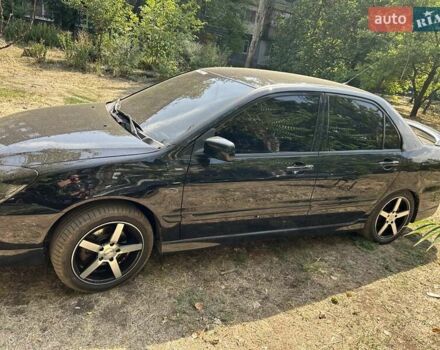 Мицубиси Лансер 2007 в Краматорске на Automoto.ua Черный Мицубиси Лансер, объемом двигателя 2 л и пробегом 193 тыс. км за 6250 $, фото 2 на Automoto.ua