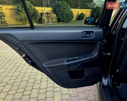 Чорний Міцубісі Lancer, об'ємом двигуна 2 л та пробігом 260 тис. км за 6555 $, фото 29 на Automoto.ua