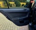 Чорний Міцубісі Lancer, об'ємом двигуна 2 л та пробігом 260 тис. км за 6555 $, фото 29 на Automoto.ua