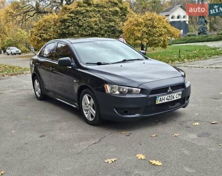 Міцубісі Lancer 2007 у Києві на Automoto.ua Чорний Міцубісі Lancer, об'ємом двигуна 2 л та пробігом 115 тис. км за 5000 $, фото 12 на Automoto.ua