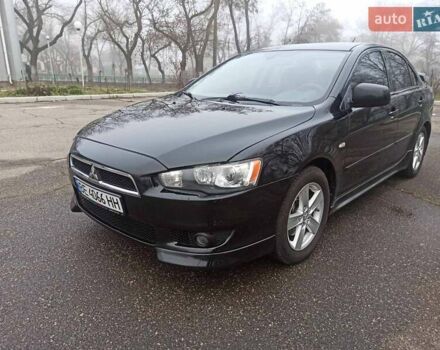 Черный Мицубиси Лансер, объемом двигателя 2 л и пробегом 195 тыс. км за 7899 $, фото 8 на Automoto.ua