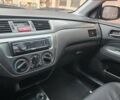 Мицубиси Лансер 2007 в Кривом Роге на Automoto.ua Черный Мицубиси Лансер, объемом двигателя 1.6 л и пробегом 200 тыс. км за 4900 $, фото 13 на Automoto.ua