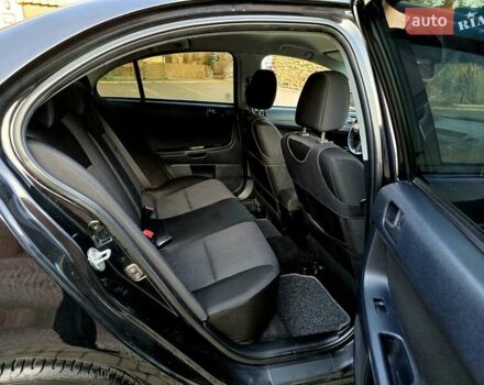 Чорний Міцубісі Lancer, об'ємом двигуна 2 л та пробігом 260 тис. км за 6555 $, фото 42 на Automoto.ua
