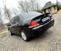 Чорний Міцубісі Lancer, об'ємом двигуна 1.6 л та пробігом 216 тис. км за 4990 $, фото 2 на Automoto.ua