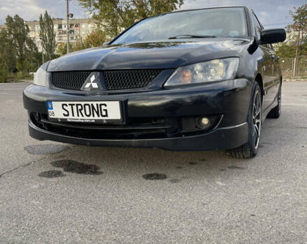 Чорний Міцубісі Lancer, об'ємом двигуна 2 л та пробігом 280 тис. км за 4600 $, фото 7 на Automoto.ua