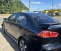 Черный Мицубиси Лансер, объемом двигателя 2 л и пробегом 3 тыс. км за 5650 $, фото 4 на Automoto.ua