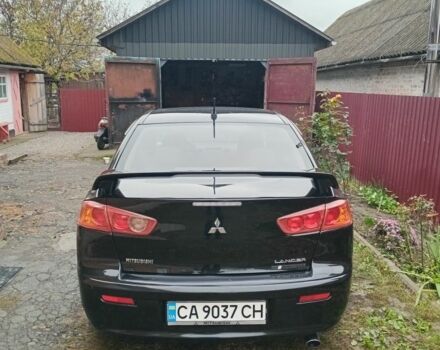 Чорний Міцубісі Lancer, об'ємом двигуна 2 л та пробігом 273 тис. км за 7100 $, фото 3 на Automoto.ua