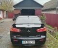 Чорний Міцубісі Lancer, об'ємом двигуна 2 л та пробігом 273 тис. км за 7100 $, фото 3 на Automoto.ua