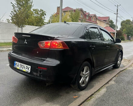 Чорний Міцубісі Lancer, об'ємом двигуна 2 л та пробігом 292 тис. км за 4400 $, фото 6 на Automoto.ua