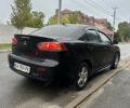 Чорний Міцубісі Lancer, об'ємом двигуна 2 л та пробігом 292 тис. км за 4400 $, фото 6 на Automoto.ua