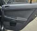 Міцубісі Lancer 2007 у Києві на Automoto.ua Чорний Міцубісі Lancer, об'ємом двигуна 2 л та пробігом 115 тис. км за 5000 $, фото 14 на Automoto.ua