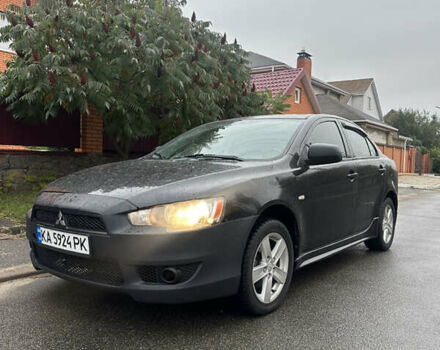 Чорний Міцубісі Lancer, об'ємом двигуна 2 л та пробігом 292 тис. км за 4400 $, фото 1 на Automoto.ua