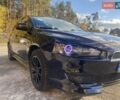 Мицубиси Лансер 2007 в Гостомель на Automoto.ua Черный Мицубиси Лансер, объемом двигателя 2 л и пробегом 258 тыс. км за 7200 $, фото 11 на Automoto.ua