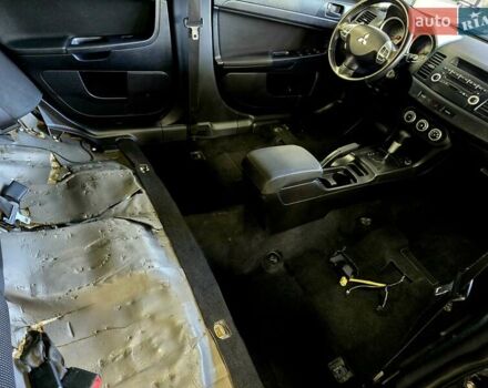 Чорний Міцубісі Lancer, об'ємом двигуна 2 л та пробігом 260 тис. км за 6555 $, фото 45 на Automoto.ua
