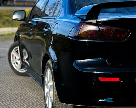 Черный Мицубиси Лансер, объемом двигателя 2 л и пробегом 333 тыс. км за 7300 $, фото 6 на Automoto.ua