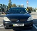 Чорний Міцубісі Lancer, об'ємом двигуна 1.6 л та пробігом 291 тис. км за 3950 $, фото 1 на Automoto.ua