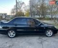 Черный Мицубиси Лансер, объемом двигателя 2 л и пробегом 280 тыс. км за 5400 $, фото 3 на Automoto.ua