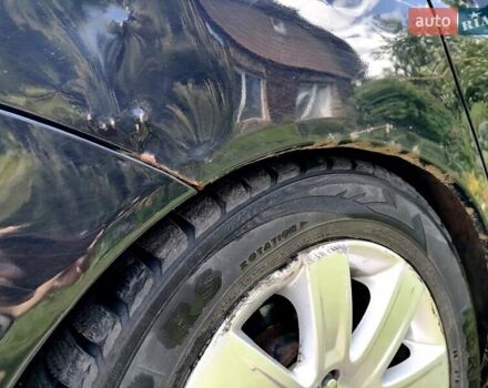 Черный Мицубиси Лансер, объемом двигателя 1.58 л и пробегом 200 тыс. км за 4000 $, фото 1 на Automoto.ua