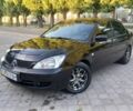 Чорний Міцубісі Lancer, об'ємом двигуна 1.6 л та пробігом 245 тис. км за 4113 $, фото 1 на Automoto.ua