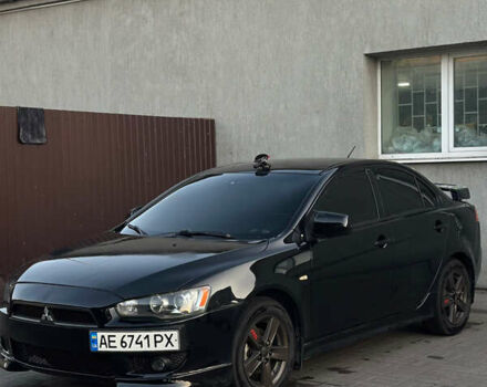 Чорний Міцубісі Lancer, об'ємом двигуна 2 л та пробігом 256 тис. км за 5500 $, фото 1 на Automoto.ua