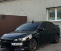 Чорний Міцубісі Lancer, об'ємом двигуна 2 л та пробігом 256 тис. км за 5500 $, фото 1 на Automoto.ua
