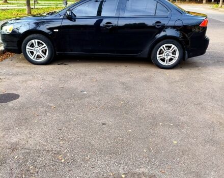 Черный Мицубиси Лансер, объемом двигателя 1.5 л и пробегом 207 тыс. км за 5500 $, фото 4 на Automoto.ua