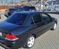 Міцубісі Lancer 2007 у Чернівцях на Automoto.ua Чорний Міцубісі Lancer, об'ємом двигуна 1.58 л та пробігом 247 тис. км за 4300 $, фото 2 на Automoto.ua