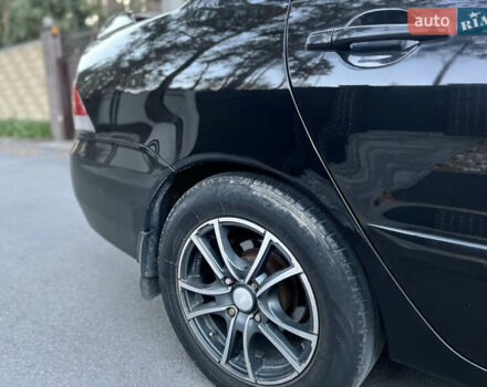 Черный Мицубиси Лансер, объемом двигателя 1.58 л и пробегом 278 тыс. км за 4800 $, фото 13 на Automoto.ua