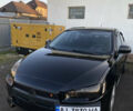 Черный Мицубиси Лансер, объемом двигателя 2 л и пробегом 164 тыс. км за 8300 $, фото 1 на Automoto.ua