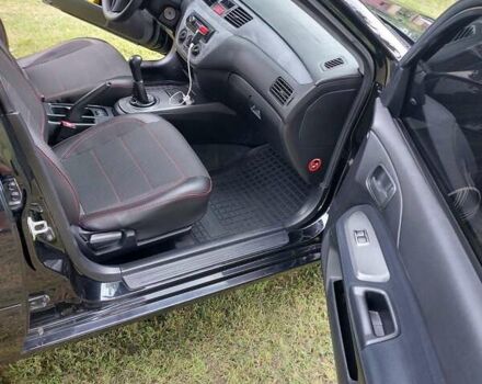 Чорний Міцубісі Lancer, об'ємом двигуна 1.6 л та пробігом 210 тис. км за 5500 $, фото 6 на Automoto.ua