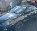 Чорний Міцубісі Lancer, об'ємом двигуна 1.58 л та пробігом 286 тис. км за 4700 $, фото 1 на Automoto.ua